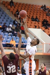 Senior Cedric Blossom puts up a layup against University of Maryland Eastern Shore. Photo by Terry Wright.