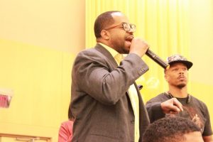 Councilman Nick Mosby addresses the crowd at the Iota Phi Theta Project X Stroll Off to remind students to vote. Photo by Terry Wright.