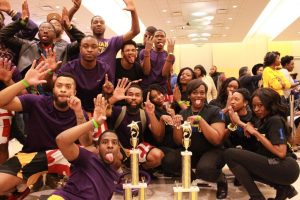 Omega Psi Phi and Sigma Gamma Rho celebrate after winning in their respective fields at the Project X Stroll Competition. Photo by Terry Wright.