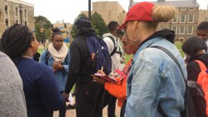 Kendra Hawkins talking to students, getting signatures for the petition. Photo credit: Penelope Blackwell