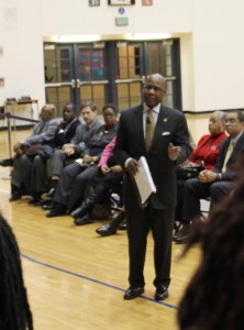 President David Wilson is flanked by administrators for Town Hall meeting