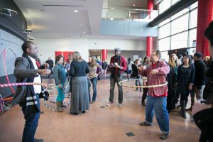 Andreas "Spilly" Spiliadis hula hooping with audience members during the afternoon break.