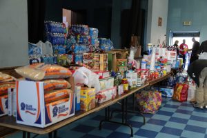 A table full of food at the St. Peter Claver Church's dinner and food drive.