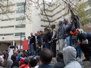 Many more protesters protesting outside of City Hall. 