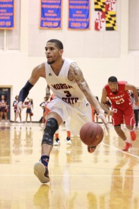 Senior guard Rasean Simpson begins to drive for a layup. Photo by Terry Wright