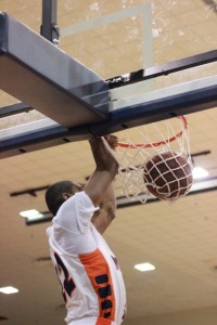 Sophomore forward Phillip Carr dunks in the second half against Howard. Photo by Terry Wright