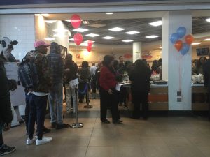 Students stand in line in the University Student Center Food Court during its reopening. Photo by Benjamin McKnight III