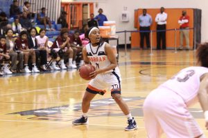 Sophomore Zuri White analyzes the floor against North Carolina Central University. Photo by Terry Wright.