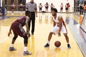 Freshman Martez Cameron sizes up his matchup against North Carolina Central University. Photo by Terry Wright.