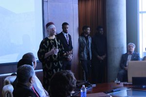 Senior Chinedu Nwokeafor, flanked by members of S.M.O.O.T.H., addresses the Board of Regents regarding the murder of Morgan student Gerald Williams. Photo by Akira Kyles.