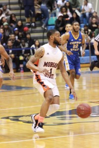 Senior Donte Pretlow brings the ball up the court against Coppin State on Monday night. Photo by Terry Wright.