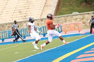 Orlando Johnson runs into the end zone for a first quarter touchdown against Holy Cross. Photo by Terry Wright.