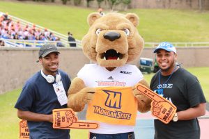 Benny the Bear with members of the MSU Live Squad at the game against Holy Cross. Photo by Terry Wright.