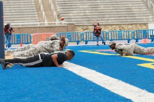 Members of the Morgan State Bear Battalion complete push ups after the Bears scored against Photo by Terry Wright. Photo by Terry Wright.