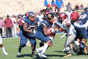 Sophomore running back Eric Harrell runs the ball against NCCU. Photo by Terry Wright.
