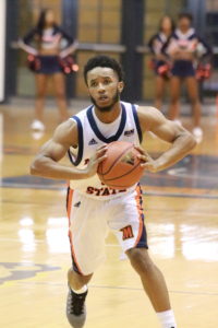 Sophomore Martez Cameron sets up to pass to a teammate in Tuesday's loss to High Point. Photo by Terry Wright