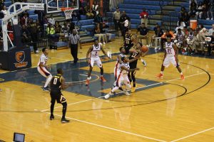 The Bears defense attempts to stifle a Towson scoring attempt early in Tuesday's contest. Photo by Wyman Jones.