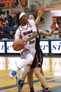 Junior Tykyrah Williams attempts a layup against Washington Adventist. Photo by Terry Wright.