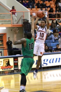 Sophomore guard Antonio Gillespie puts up a shot against Wilmington University. Photo by Terry Wright.