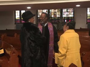 Reverend Bernard Keels, dean of the Morgan State University Chapel, with members of Sharp Street Methodist Episcopal Church. Photo by Benjamin McKnight III.