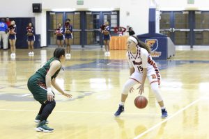 Sophomore guard Chelsea Mitchell prepares to run a play in a 61-26 loss to FAMU. Photo by Wyman Jones.