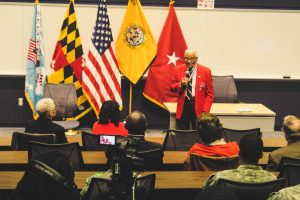 Retired Col. Charles McGee speaks to audience members during the Tuskegee Airman Symposium. Photo by Maliik Obee.