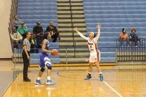 Senior guard Ivy Harrington playing defense against the Hampton Lady Pirates on Saturday. Photo by Wyman Jones.