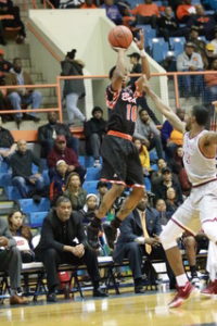 Sophomore guard Antonio Gillespie shoots a three-pointer in a loss to NCCU. Photo by Terry Wright.