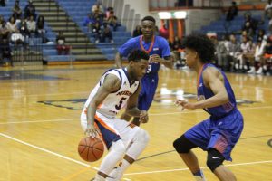 Junior guard Tiwian Kendley handles the ball against Savannah State University earlier this season. Photo by Wyman Jones.